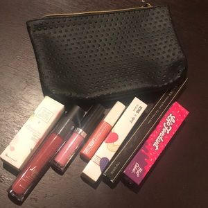Ipsy lip gloss, lip pencil and makeup bag